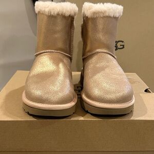 Moving sale. Brand new Women’s UGG boots. (Looks like Rose gold color)